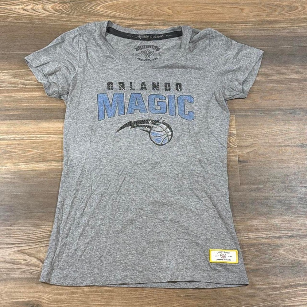 Gray Orlando Magic cotton t-shirt with blue 'MAGIC' text and basketball logo
